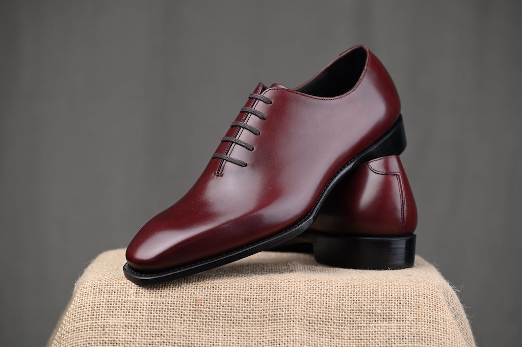 Red leather sales sole shoes